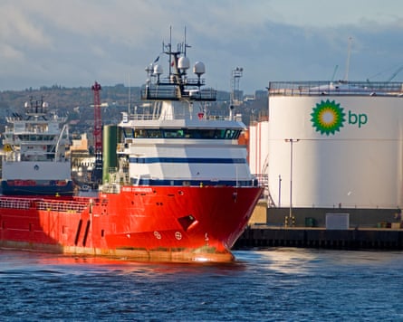 The oil support vessel Skandi Commander at Aberdeen harbour with a BP facility in the background