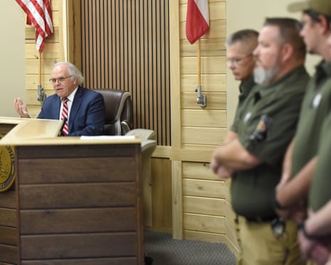 Fired members of the Cohutta Police Department look on as Mayor Ron Shinnick speaks at Cohutta Town Hall in Cohutta, Ga. on Thursday, April 30, 2026. (Matt Hamilton/Chattanooga Times Free Press via AP)