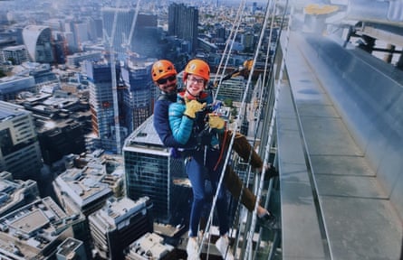 Grace Spence Green abseiling on a skyscraper