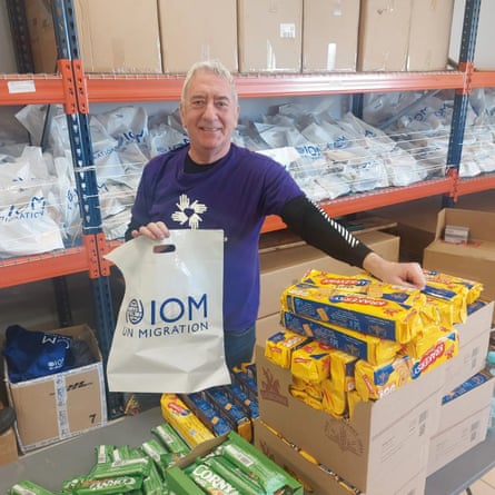 Steve Wallis, pictured with food supplies, volunteering in Ukraine