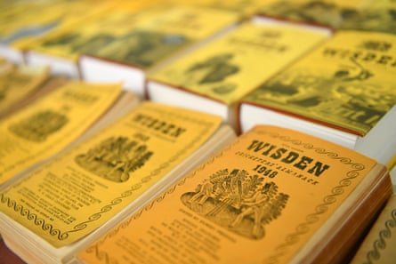 Copies of the Wisden Cricketers’ Almanack are displayed at a book sale