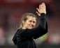 Marie-Louise Eta applauds the Union Berlin fans after a 3-1 victory at Mainz during her tenure as interim head coach of the men’s team
