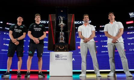 Team New Zealand's Peter Burling (second left) and Nathan Outteridge (left) pose with Ineos Britannia's Ben Ainslie (second right) and Dylan Fletcher (right) during the presentation of 37th America's Cup in Barcelona