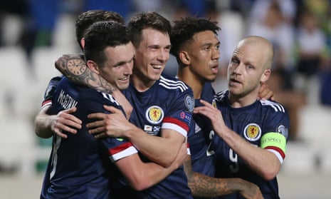 John McGinn celebrates after putting Scotland back in front.