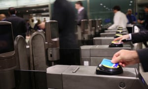 Oyster cards being used on London underground