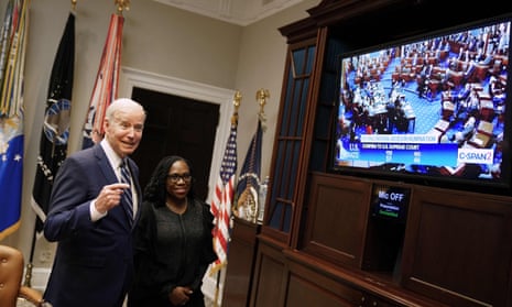 Ketanji Brown Jackson watches the Senate vote with Joe Biden at the White House.