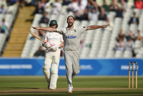 Chris Woakes celebrates a wicket.
