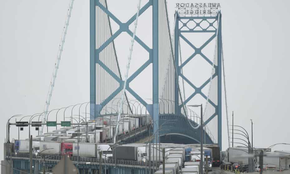 Trucks backed up on the Ambassador Bridge in Detroit on Monday.