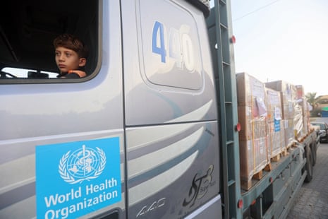 A Palestinian boy is pictured in a World Health Organization truck at the Nasser hospital in Khan Younis in the southern Gaza Strip on 23 October 2023. Rik Peeperkorn, the WHO’s representative for the occupied Palestinian territories, has condemned the “shrinking humanitarian space” in Gaza.