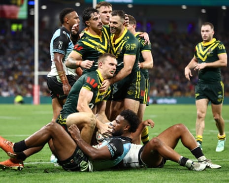 Tom Trbojevic celebrates scoring a try during the men's Rugby League World Cup match against Fiji at Suncorp Stadium.