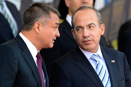 Pictured in 2012, former Mexican president Felipe Calderón (right) has been implicated in the trial of Genaro Garcia Luna (left).