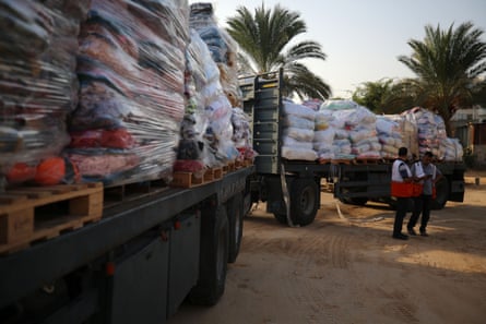 Red Crescent workers sort aid newly arrived in Gaza.