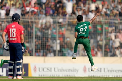 Hasan Mahmud leaps in the air after dismissing England's Jos Buttler