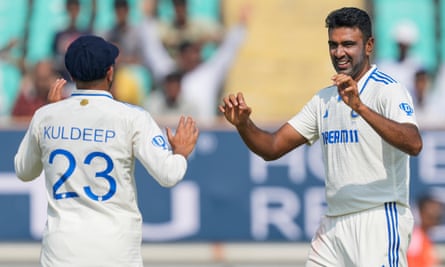 India’s Ravichandran Ashwin (right) celebrates with Kuldeep Yadav after dismissing Zak Crawley for his 500th Test wicket.
