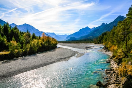 The River Lech near Forchach, Austria, with the Lechtal Alps in the distance