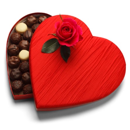 Red Heart Box of Chocolates with Rose Isolated on White Background