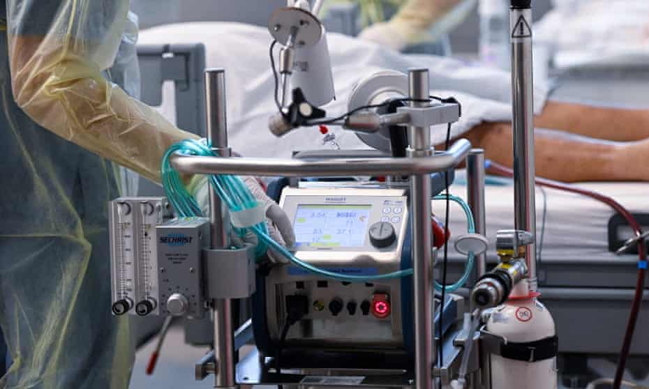 A patient affected by the Covid-19 coronavirus lies with a artificial respiration ECMO in a Covid-19 intensive care unit