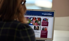Woman uses laptop to view Guardian website for Web we want