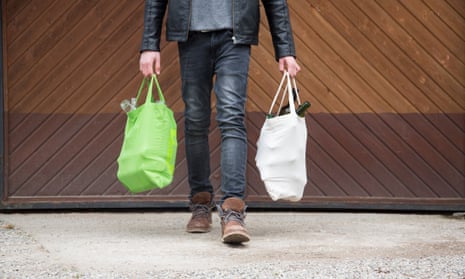 Boy carrying shopping bags