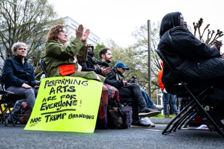 a person next to a sign