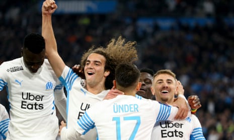 Mattéo Guendouzi leads the celebrations after Cengiz Under’s successful penalty for Marseille against Montpellier.