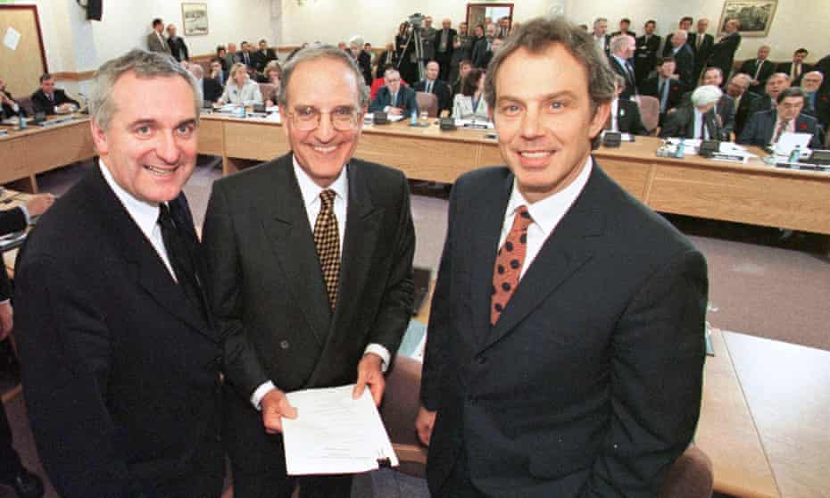 Bertie Ahern, US senator George Mitchell and Tony Blair after signing the Good Friday agreement on 10 April 1998.