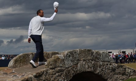 Tiger Woods waves to the fans at St Andrews