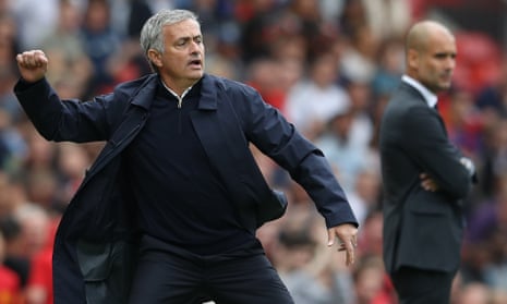 The Manchester United manager, José Mourinho, left, makes a point during a derby against Pep Guardiola’s Manchester City