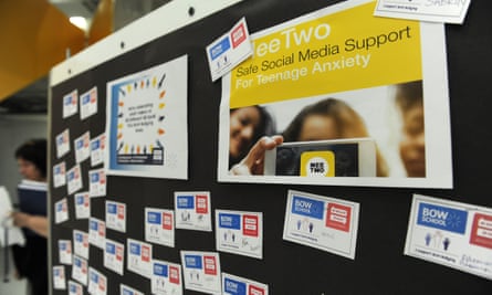 Posters promote MeeTwo at Bow school.