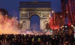 Demonstrators gather near the Arc de Triomphe in an anti-government demonstration.
