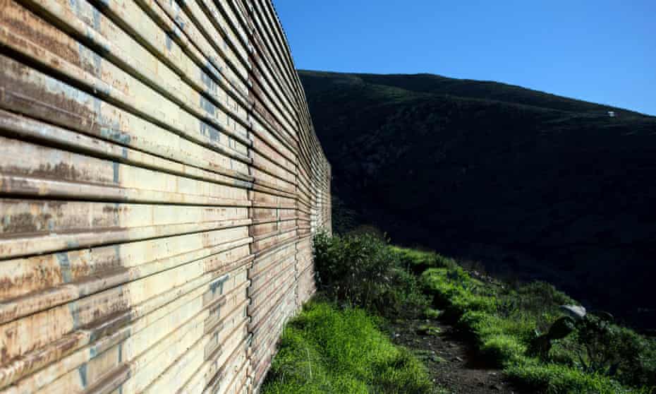 The border fence between Mexico and the US. Washington is gearing up for a fraught battle over the proposal. 