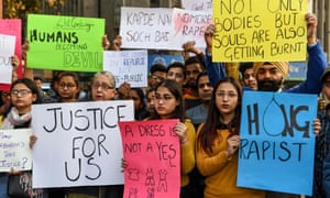 Students and social workers in Amritsar hold placards during a protest seeking for justice for the rape case of a 27-year-old from Hyderabad.