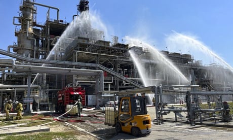 Russian firefighters at the scene of a fire at the Novoshakhtinsk oil processing plant in the Rostov-on-Don region.