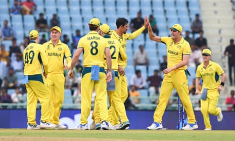 Australia’s Mitchell Starc celebrates the wicket of Sri Lanka ‘s Dhananjaya in front of empty seats.