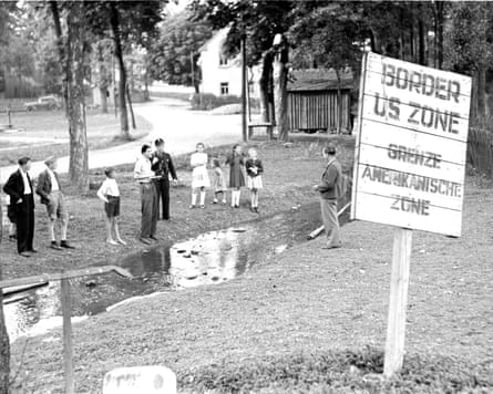 The Tannbach river demarcation line between Mödlareuth-West in the American occupation zone and Mödlareuth-East in the Soviet occupation zone, July 1949.