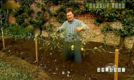 Alan Titchmarsh, jeans blurred, on North Korean television.