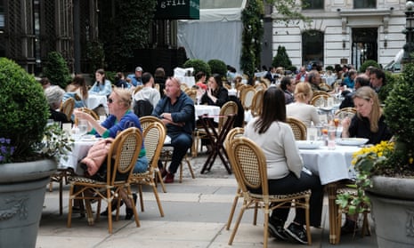 People dine outside in New York City on 4 May. 