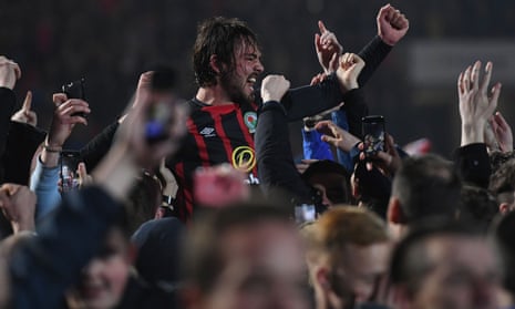 Bradley Dack of Blackburn Rovers celebrates with their fans after securing promotion back to the Championship.