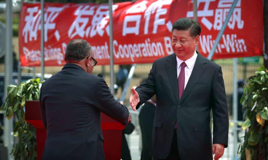 Papua New Guinea’s former prime minister Peter O’Neill and China’s president Xi Jinping shake hands