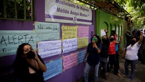 Women protest outside the headquarters of Las Mélidas, a women’s rights and health organisation that was raided this week by prosecutors in El Salvador
