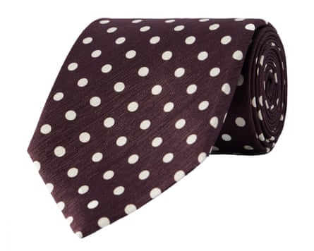 A rolled up Tom Ford polka dot tie