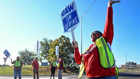 'This is history': car workers walk out in biggest auto strike in generations – video report