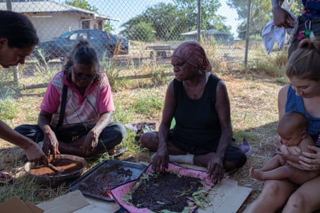 Joanne Stevens (L) and Margaret Paddy lead a bush medicine harvesting project through the Ngaliwany Purrp’ku Child and Family Centre in Kalkarindji. Stevens and Paddy made bush tea as a remedy for Covid-19 symptoms and delivered it to families in houses that were isolating in the community.