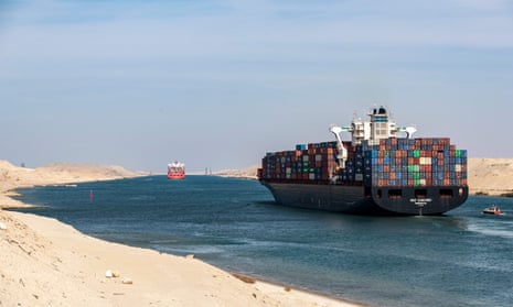 Container ship sailing through Suez canal