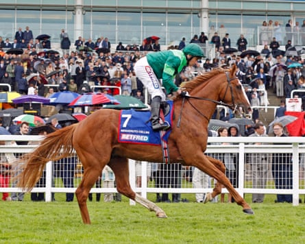 Ryan Moore rides race favourite Benvenuto Cellini up to the start of the Derby
