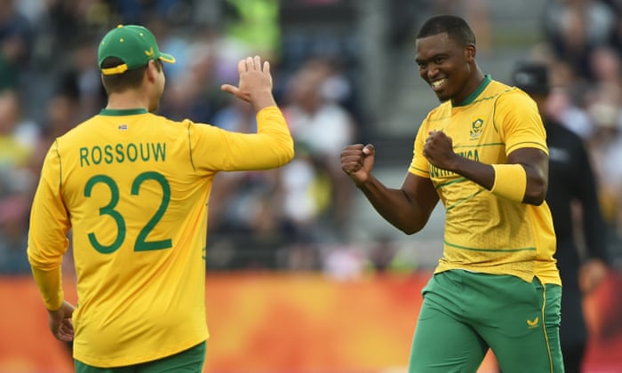 Lungi Ngidi of South Africa (right) celebrates with Rilee Rossouw after he gets Jason Roy of England out.