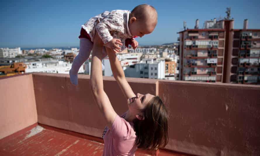 Ukrainian refugee Victoria Bielova, 18 years old, plays with her 9-month daughter Vladyslava in Algeciras.