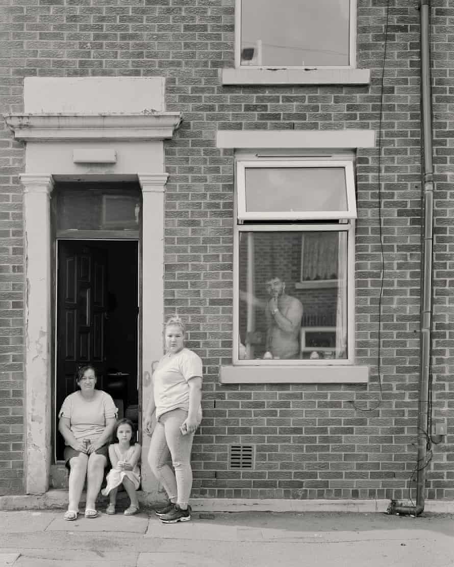 The view from Bank Top: Craig Easton’s images of life in Blackburn | Photography 5 Three generations of the Williamson family inside and outside their home on Johnson Street, Bank Top