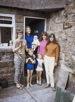 Cocker aged seven with his mum, grandma, sister, aunties Mandy and Jutta and Nif the cat.