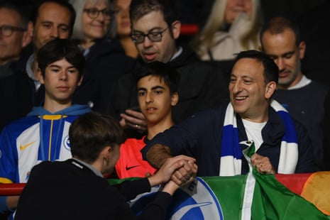 Brighton owner Tony Bloom interacts with fans in the stands prior to the Premier League match between Brentford FC and Brighton & Hove Albion.